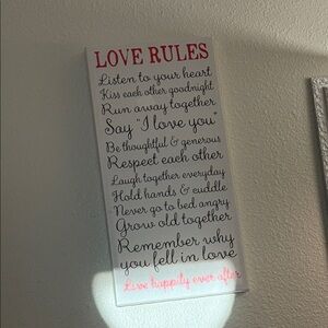 Love Rules Wall Art with Red and Black Text